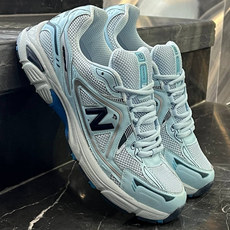 کفش کتانی مردانه بزرگ پا نیوبالانس 1064 آبی تمام 1064 New Balance