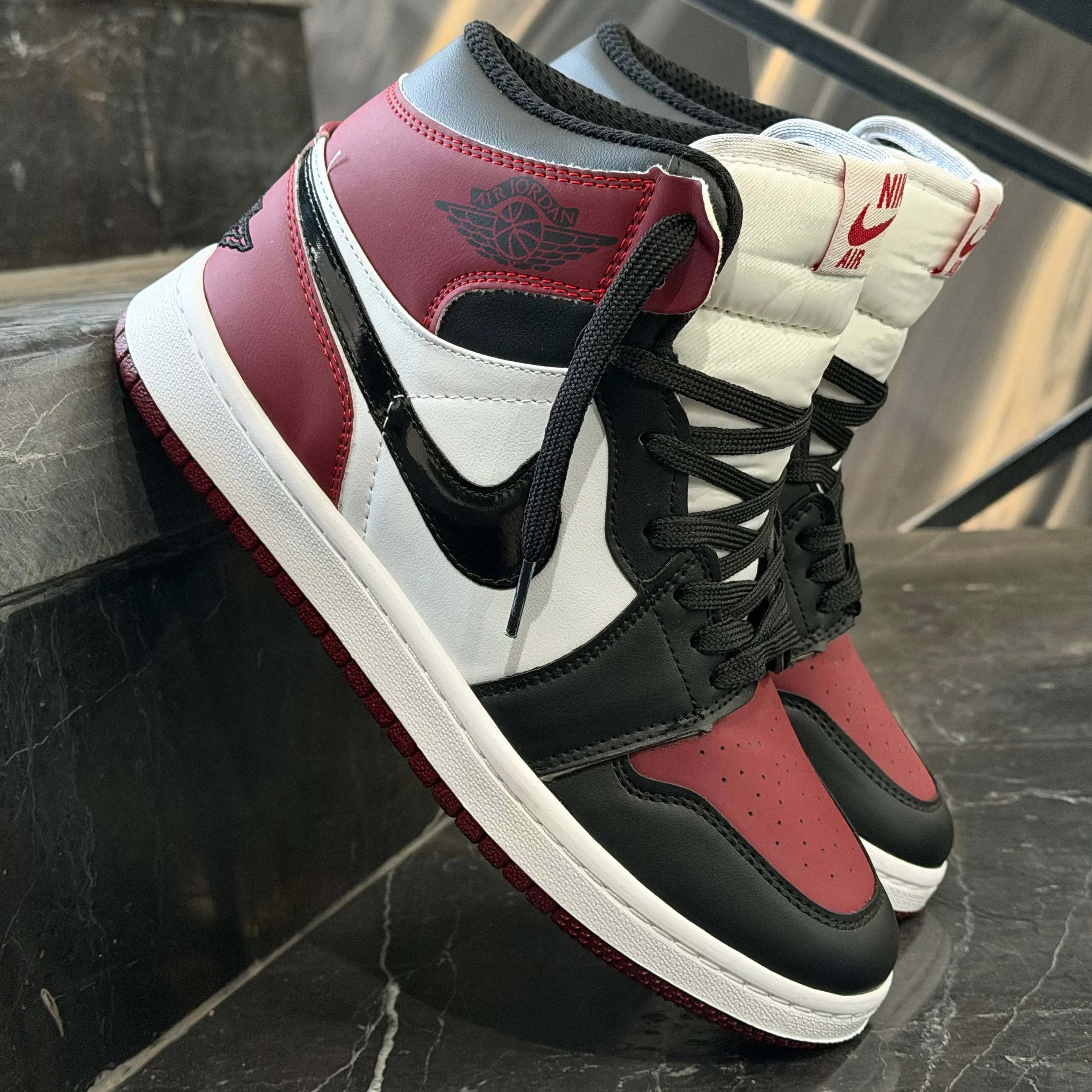 کفش کتانی مردانه نایک جردن 1 ساقدار مشکی چری Nike Jordan 1