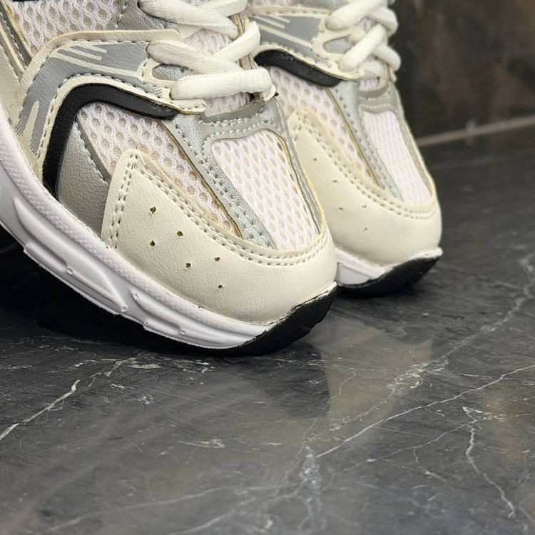 کفش کتانی نیوبالانس 530 سفید مشکی بچگانه NEW BALANCE 530